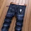 Mäns Jeans Mäns Straight Pants Streetwear Denim Slim Fit Distressed Ripped Trouser med fläckar Desinger Hip Hop Hombre1