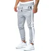 Nouveaux hommes Joggers pantalons hommes rayé taille élastique vêtements de sport mâle Slim Fit entraînement course pantalons de survêtement 201221