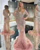 2022 Luxus Meerjungfrau Abendkleider mit Federn Perlen Lange Ärmel Pailletten Spitze Applikationen Damen Abendkleid Schatz bodenlang Robe De Soriee