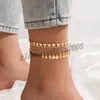 Jolies anklets de glands pour femmes pour femmes jolies fleurs en alliage d'or en métal ajustable patte bijoux