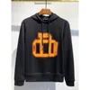 Mens casual long-sleeved fashion hooded sweatshirt autumn and winter geometric print sweater mens all-match black and white