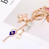 Crystal Keychain Rhinestone Smycken Fyra Leaf Clover Bil Pendant Girl Kvinnor Key Rings Creative Cute Flower Keyring Gift