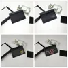 Deri toptan erkek ve kadın moda klasik Kahverengi kart çanta küçük siyah kafes eğlence kredi mektubu klip deri ultra-ince