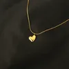 Titanium med 18k guld söt hjärta halsband kvinnor rostat stål smycken party designer t Visa Runway Gown Sweety Japan Koreansk Q0531