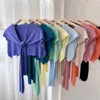 kinder strickten ponchos