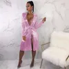 BE HYGGE Sexy Glitter Silver Tassel Dress Femmes Deep V-Neck Lace Up Robe à manches longues Femme Shiny Slit Party Club Robes 201028