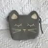 新しい子供のコイン財布の赤ん坊の猫のミニショルダーバッグかわいい王女メッセンジャーバッグFaux Suedeの小さな袋