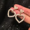 Bellissimi orecchini di perle intrecciate nuovi orecchini a bottone con pendente a cuore alla moda per studentesse e studentesse S925 argento post