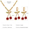 Set di gioielli per la festa nuziale calda in Europa Set di orecchini per collana di ciliegie rosse di melograno per le donne Accessori di moda in erba di cristallo