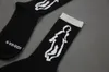 Three pairs of shadow alien orange eyes cotton sports tube Street trend socks for men and women