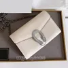Luksusowy projektant portfel damski na łańcuszkowej torbie na ramię Cross Body lustro jakość prawdziwej skóry bydlęcej WOC portmonetka damska kopertówka Dion małe torby crossbody