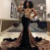2022 Seksowne arabskie czarne aksamitne sukienki na bal maturę plus size v szyja złote cekinowe koronkowe aplikacje