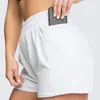 Pantalones cortos para correr Mujer Cintura alta deporte Color sólido Slim Fit Pantalones cortos delástico con bolsillo lateral de fondo elástico de verano