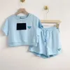 レディースツーピースパンツショートセットトライアングルコットンTシャツヴォーグレター印刷カジュアルセクシーなコットンTシャツショーツスリーブ女性スーツ