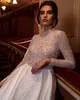 Sparkly Sequined Backless Wedding Dresses High Neck A Line Long Sleeves Bridal Gowns Sweep Train Tulle robe de mariée