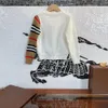Diseñador ropa chica suéter de punto de punto de sujeción de highending children039s ropa de otoño kid039s suéter de cárdigano rayado270p3709986
