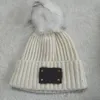 Es gibt Logo Erwachsene Dicke warme Wintermütze für Frauen Weiche Stretch-Zopfstrickmützen Hüte Damen Skullies Girl Ski Cap