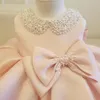 Neue Mode Perlen Schleife Blumenmädchenkleider Für Hochzeit Prinzessin Flauschigen Tüll Baby Mädchen Taufe Taufe Geburtstagskleid LJ2012224629546