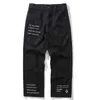 Мужчины грузовые брюки Уличная одежда хип-хоп разорвал разрушенные дырочные гаремы брюки брюки мужские моды свободные мешковатые брюки черный HD005 H1223