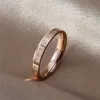 Brevförändring Ring Män och Kvinnor Nisch High-End Light Luxury 18K Rose Gold Couple Titanium Steel Fashion Smycken