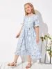 Robe fleurie ceinturée à volants pour filles SHE