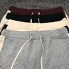 Pantaloni da uomo Pantaloni della tuta Pantaloni riflettenti stile jogger Pantaloni da lettera 4 colori