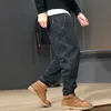 Masowe streetwear Mężczyźni dżinsy luźne fit splatane projektant harem dżinsy męskie spodnie towarowe japoński styl hip -hop joggers dżinsy homme t200614