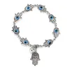 Antik silverpläterad Fatima Handblå Ond Evil Eye Charm Stretch Armband med liten klocka