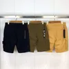 23SS Vår Sommar Cargo Shorts Herr Kvinnor Militärstil Bomull Multi Pocket Casual Kompass Badge Broderi 042501