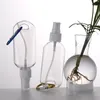 キーホルダーと50mlの空のアルコール詰め替え可能なボトルトラベルボトルスプレーキャップKKA1795のための透明な透明なプラスチック手のサニタイザーのびん