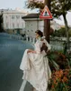 2020 Bellissimo abito da sposa con apertura sul retro in pizzo beige bohémien con maniche Abiti da sposa vintage Boho Beach Abito da sposa country plus size