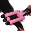 FreeShipping волос Curling Iron Ceramic Тройной Профессиональный тройной трубы бигуди ролл яйцо для укладки волос Средства для волос Styler Wand бигуди Утюги