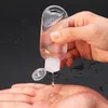 Bouteille de pulvérisation d'alcool vide de 50ML avec crochet porte-clés Bouteilles de désinfectant pour les mains en plastique transparent transparent pour le voyage