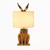 Lampes de table Promotion AC 110V Lampe de table Tissu Abat-jour Lumières Lampe Golden Animal Design Lecture simple Petite veilleuse Résine Éclairage de bureau