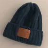 Chapeau d'hiver décontracté en laine solide, casquettes Hip-hop chaudes de printemps, chapeau tricoté Skullies, bonnets pour hommes et femmes