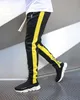 Мужские спортивные брюки GODLIKEU, летние и зимние узкие брюки для фитнеса в эластичную полоску, черные брюки для бега