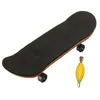 Wholesale-100mmx28mmx15mm Maple Diapositivo de madera mini tableros de dedo skateboard deportivo rodamientos negros wheels kids game gift1