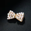 Rhinestone Pearl Bowknot Browches jewelryの女性ブライダルの花結婚披露宴パーティーオフィスブローチピンギフト高品質