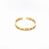 Baoliren titânio aço algarismos romanos jóias ouro amarelo oco pulseira para mulher t200423252b