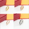 Men Diamond Dise￱ador Anillo Charmito de moda Rings de acero inoxidable para mujeres Titanio 5 6 7 8 9 9 Tama￱o Fiesta de compromiso de boda Amantes de oro Rose Anillos de pareja