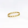 Baoliren titânio aço algarismos romanos jóias ouro amarelo oco pulseira para mulher t200423252b