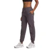 Tissé poche tenues de yoga pantalons de jogging en vrac séchage rapide élastique course fitness sport décontracté vêtements de sport cordon femmes culottes leggings serrés