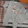 Mode rompertjes hoge kwaliteit pasgeboren babykleding katoen lange mouwen gedrukte jongen meisje jumpsuits en bib sets