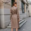 Streetwear PU Cuir Trench Coats Femmes Brown Automne Hiver Ceintures Long Manteau Cranté Bureau Dames Poche Outwear LJ201127