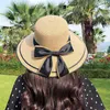 K38 Nieuwe zomer vrouwelijke Sunhat Straw Hat met gaas boog buiten zonnebrandcrème Caps Travel Fashion UV Protection Beach Sun Hat G220301