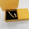 Bracelets de créateurs Classic Bracelet Mode Cinq fleur pour homme Femme Gold Silver Option Option Couleur Coeur Coeur Bracelet Simple Style 2201144D