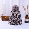 Mujeres Invierno Leopardo Sombreros de punto Moda Pom Pom Gorros Lana cálida de punto Tiene gorro Pom Beanie Caps Sombreros de fiesta Suministros 4 estilos RRA3802