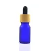 essential oil glass dropper bottle with bamboo lid bamboo serum bottle frosted green blue amber clear 10ml 15ml 20 30ml