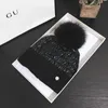 Bonnet/Crâne Casquettes Bonnets D'hiver Pour Femmes Vers Le Bas Plume Coton Fourrure Pompon Hommes Chapeaux Fil De Laine Lumineux Solide Chaud Skullies Noir Argent