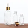 5ml 10ml 15ml 30ml 50ml 100ml Flacone contagocce in vetro trasparente Vuoto Contenitore per imballaggio cosmetico Fiale Bottiglie di olio essenziale